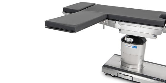 A specialized piece of surgical equipment known as a Hand Table, designed to support a patient's hand during orthopedic or reconstructive surgery.