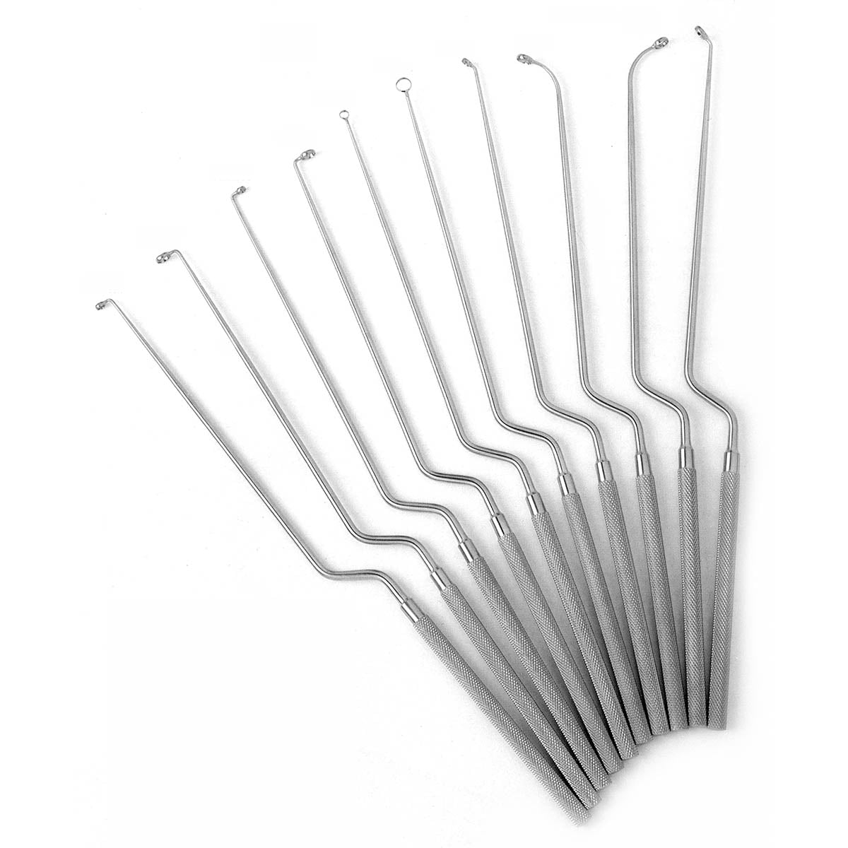 Transsphenoidal Instrument Set - A collection of metallic surgical instruments, including scissors, curettes, rongeurs, forceps, elevators, and retractors, arranged in a fanned pattern on a white background.