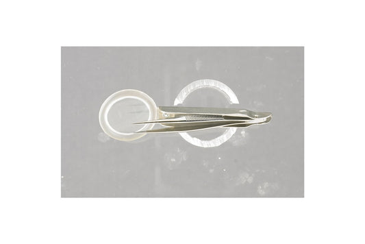 Dressing forceps in jar with cap
